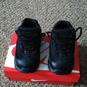 All black pair of 4c nike little max
